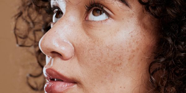 Pigmentation_Resized Beauty, skincare and natural hair of a young woman in studio for cosmetics, makeup and hair care fo.